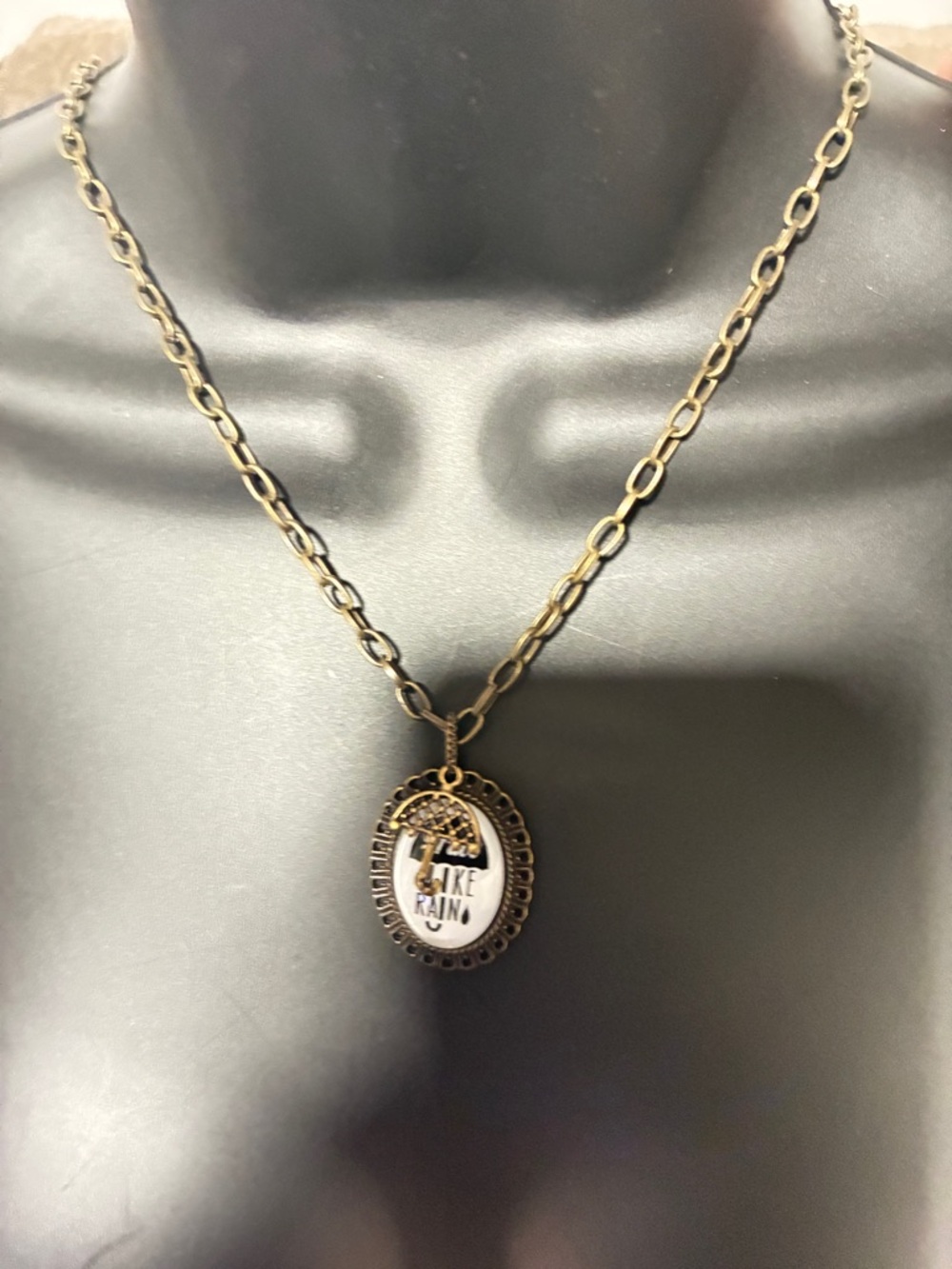 Gold-Tone 'Make It Rain' Oval Pendant Necklace